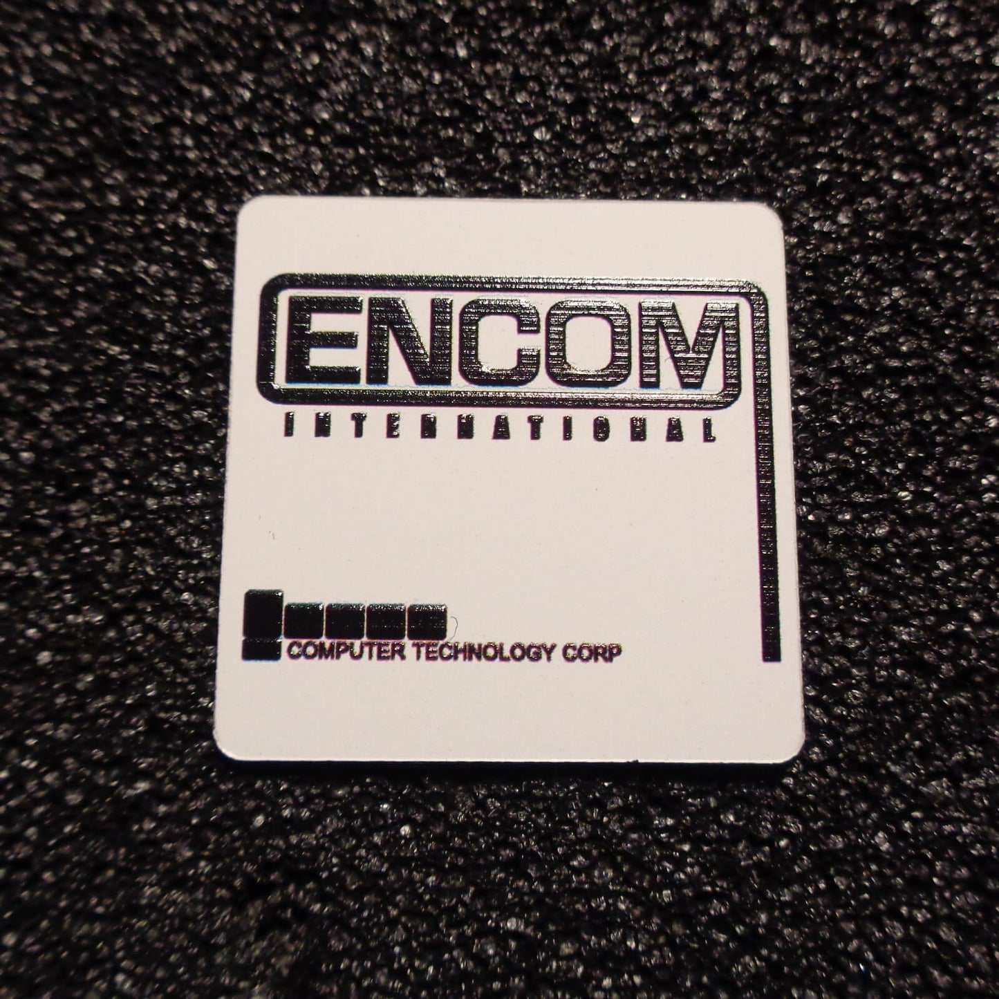 Encom International Corporation Logo