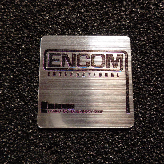 Encom International Corporation badge